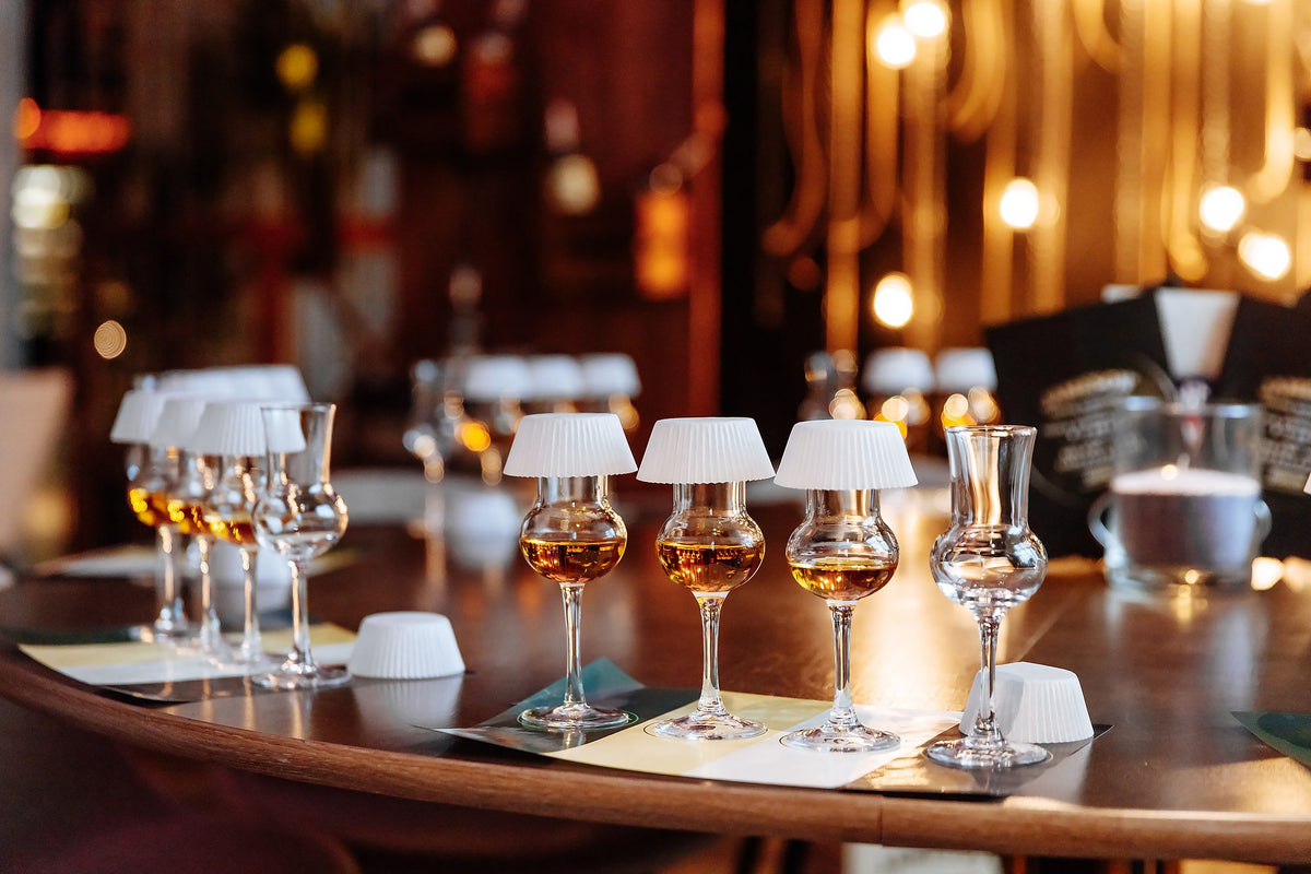 Multiple Glencairn glasses of Baroque Single Malt whisky at a quality tasting session, premium Australian whisky standards