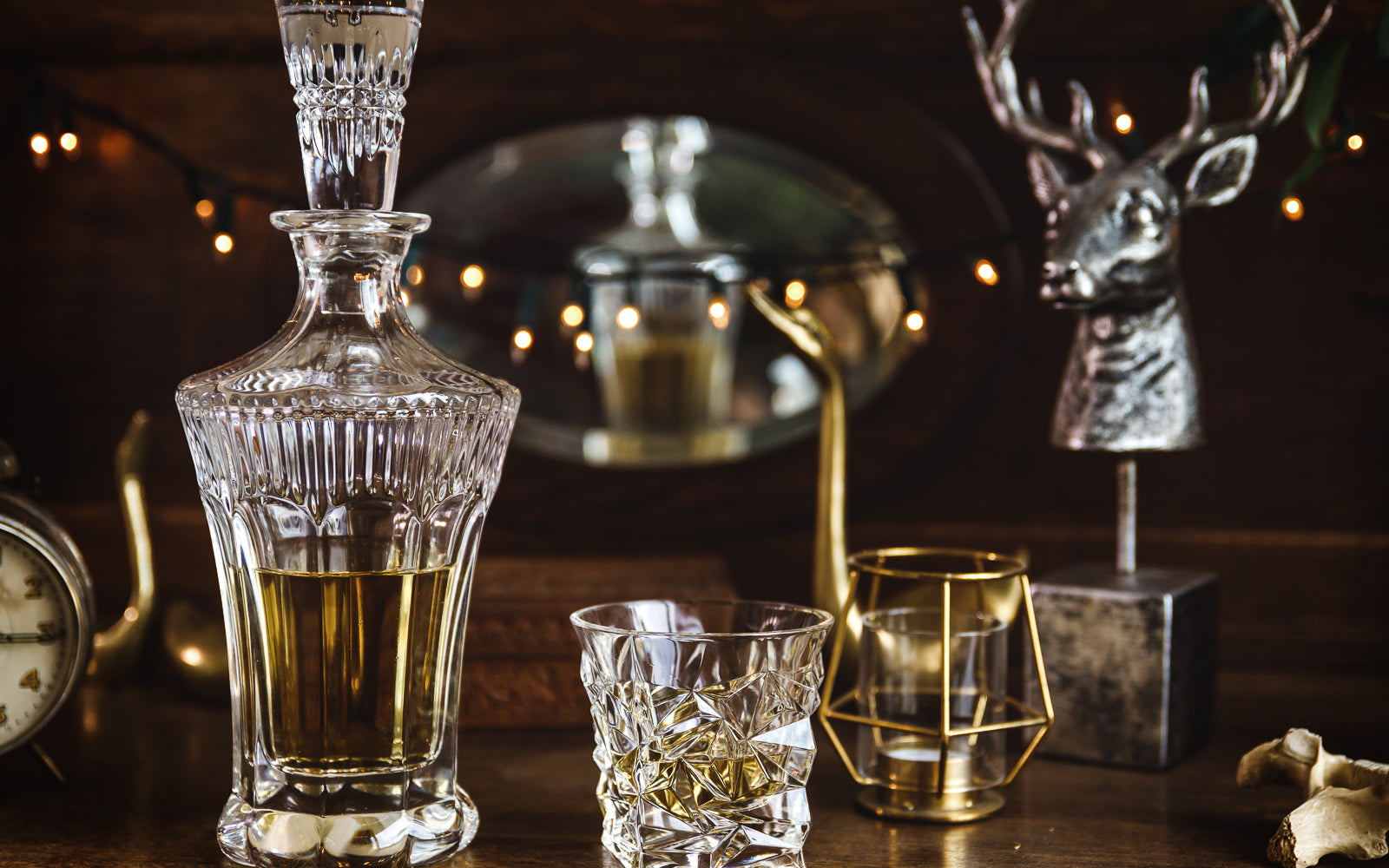 A crystal decanter and glass in a festive setting, the rituals that define whisky enjoyment. Baroque Whisky Australian Single Malt.
