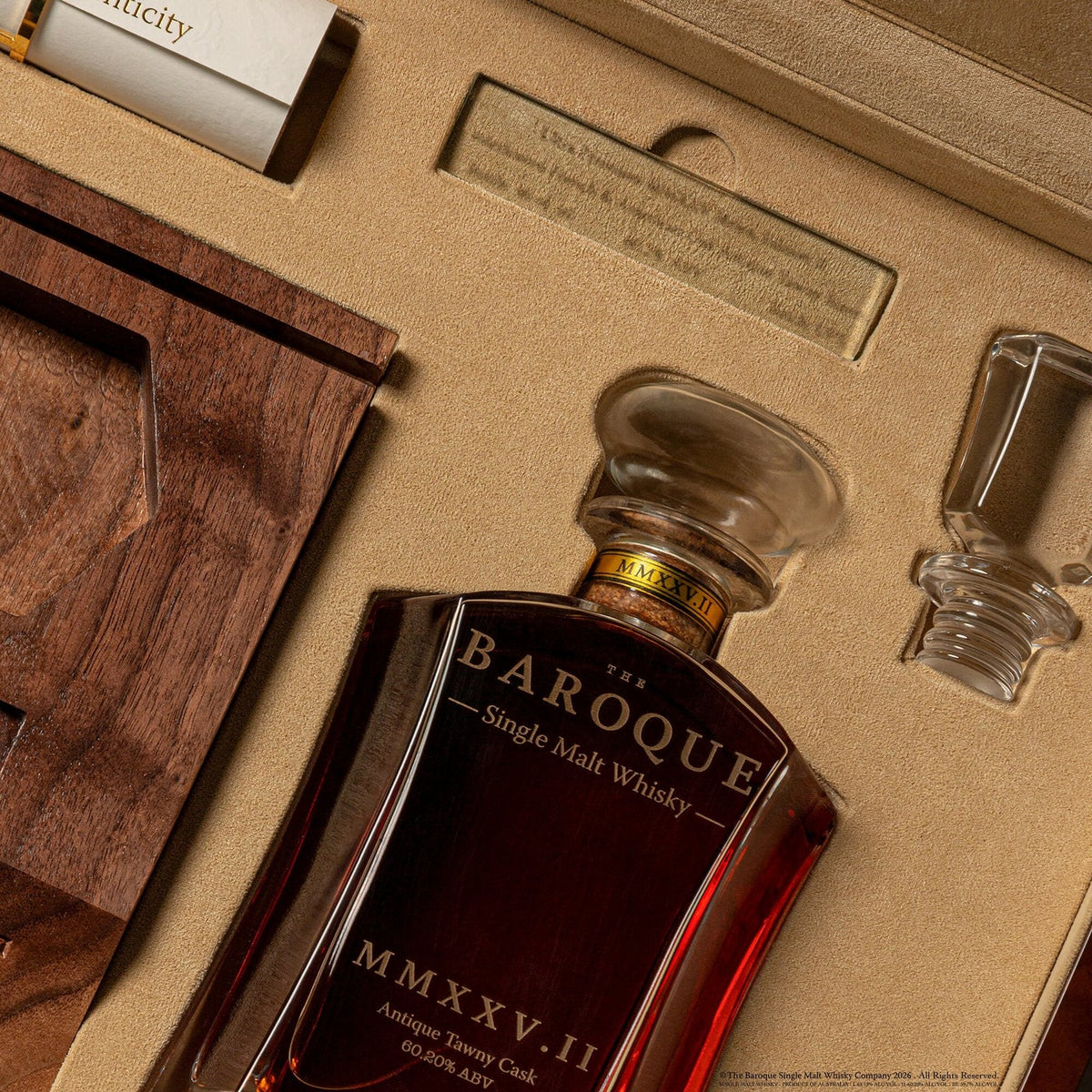 Baroque MMXXV Edition II presentation case open at reading distance, etched decanter and certificate
