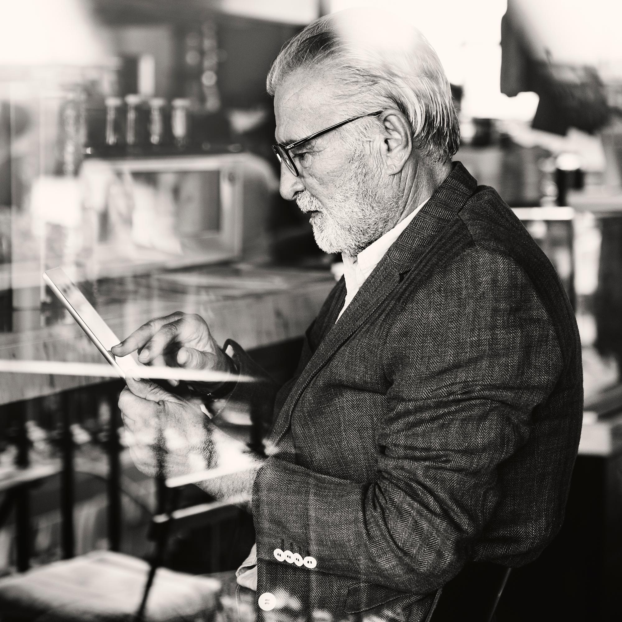 Bar owner presenting Baroque Single Malt whisky at a stockist bar